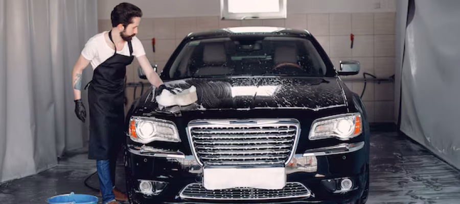 man-washing-his-car-garage_1157-26054 IMAGE